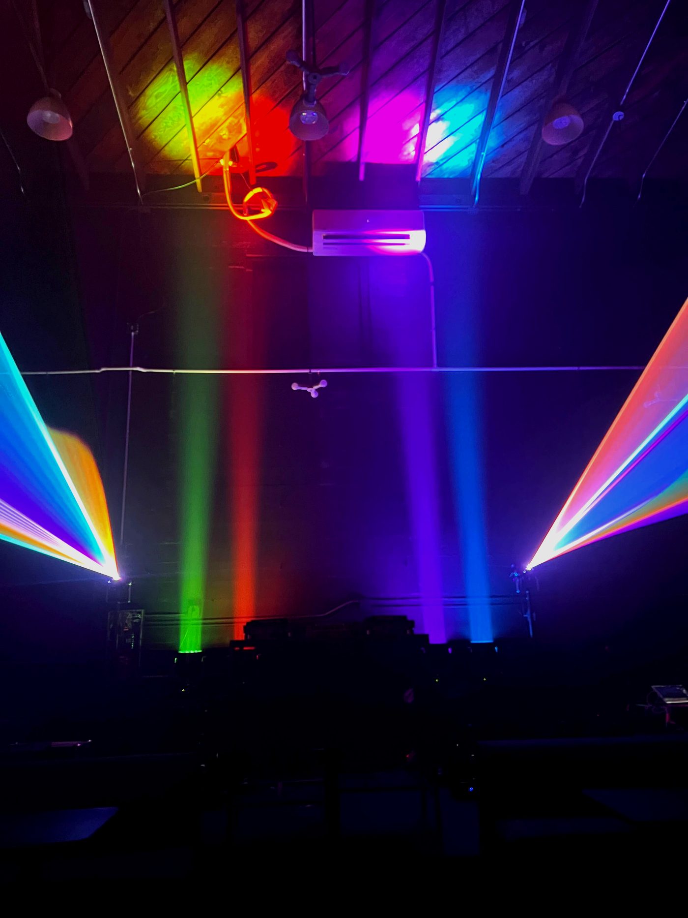 Laser symmetry across the room